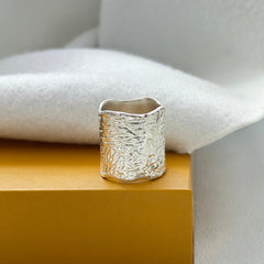 "Crushed Ice – Sculpted Silver Statement Ring"