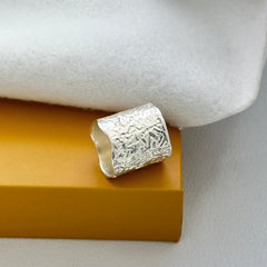 "Crushed Ice – Sculpted Silver Statement Ring"